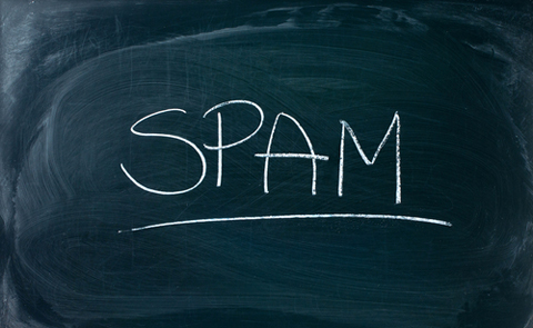 Inscription Spam sur un tableau noir